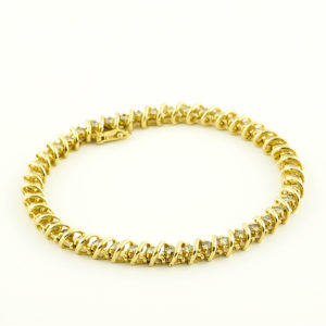 Pulsera Riviere, en Oro con 44 Diamantes talla Brillante de 2,42 ct. Color,L-M. Pureza:SI1-SI2