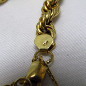 Pulsera tipo cordón, en Oro de 18k. 11,35 gr.