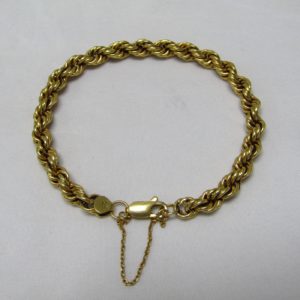 Pulsera tipo cordón, en Oro de 18k. 11,35 gr.
