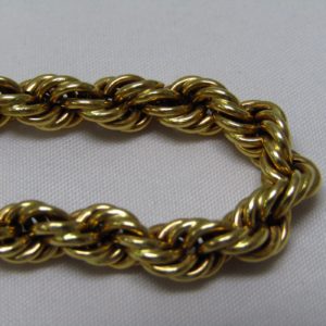 Pulsera tipo cordón, en Oro de 18k. 11,35 gr.