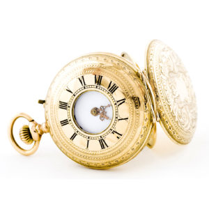 Reloj de bolsillo-colgar, ½ saboneta, remontoir. Finales siglo XIX.