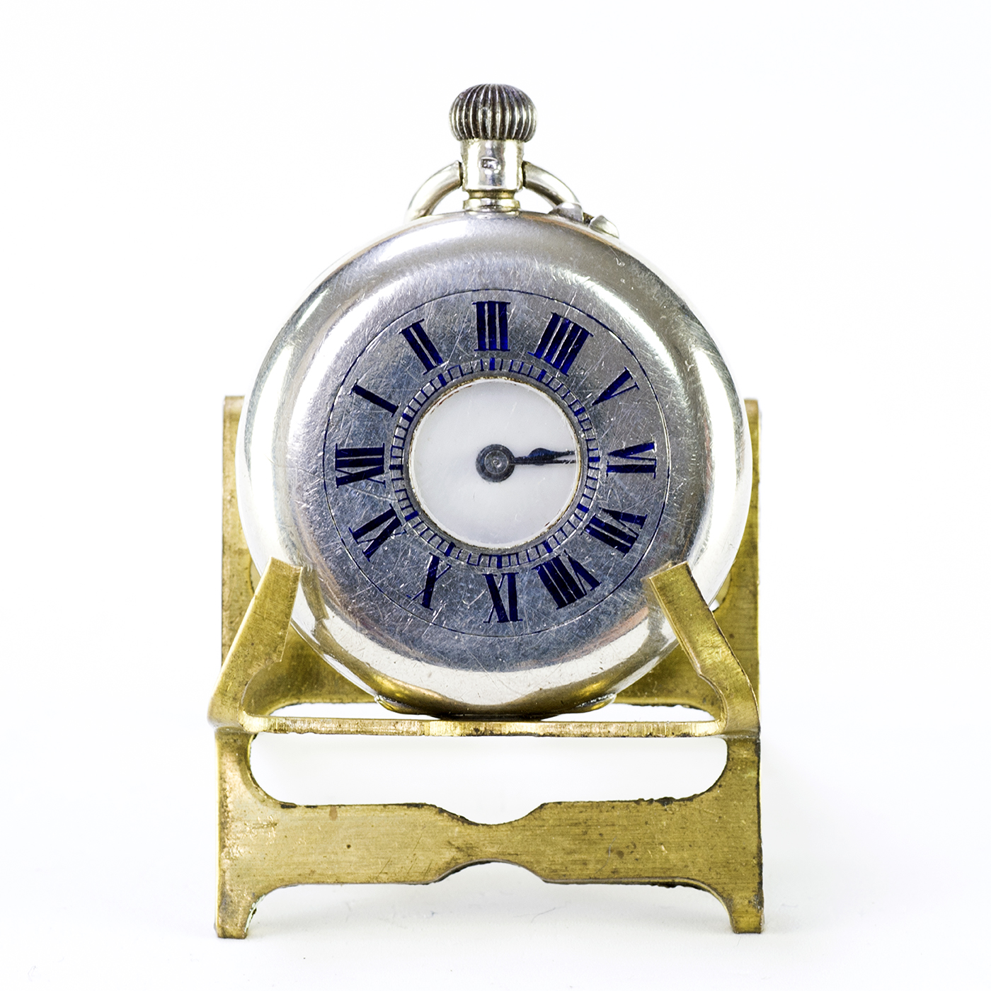 Reloj de colgar, media saboneta (hunter)y remontoir. Ca. 1900.