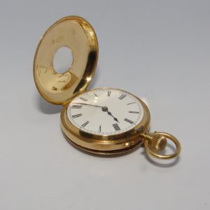 Reloj Suizo de Bolsillo, media saboneta y remontoir. Ca. 1900.