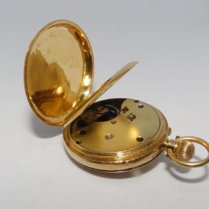 Reloj Suizo de Bolsillo, media saboneta y remontoir. Ca. 1900.