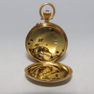 Reloj Suizo de Bolsillo, media saboneta y remontoir. Ca. 1900.