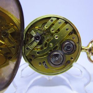 Reloj Suizo de Bolsillo, saboneta y remontoir. Oro 14k. Ca. 1890.