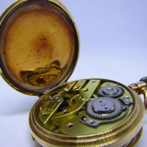 Reloj Suizo de Bolsillo, saboneta y remontoir. Oro 14k. Ca. 1890.