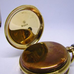 Reloj Suizo de Bolsillo, saboneta y remontoir. Oro 14k. Ca. 1890.
