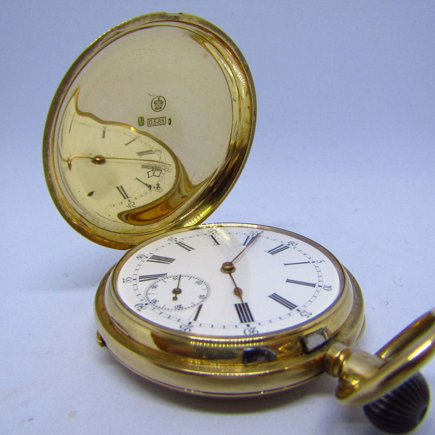 Reloj Suizo de Bolsillo, saboneta y remontoir. Oro 14k. Ca. 1890.