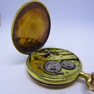 Reloj Suizo de Bolsillo, saboneta y remontoir. Oro 14k. Ca. 1890.
