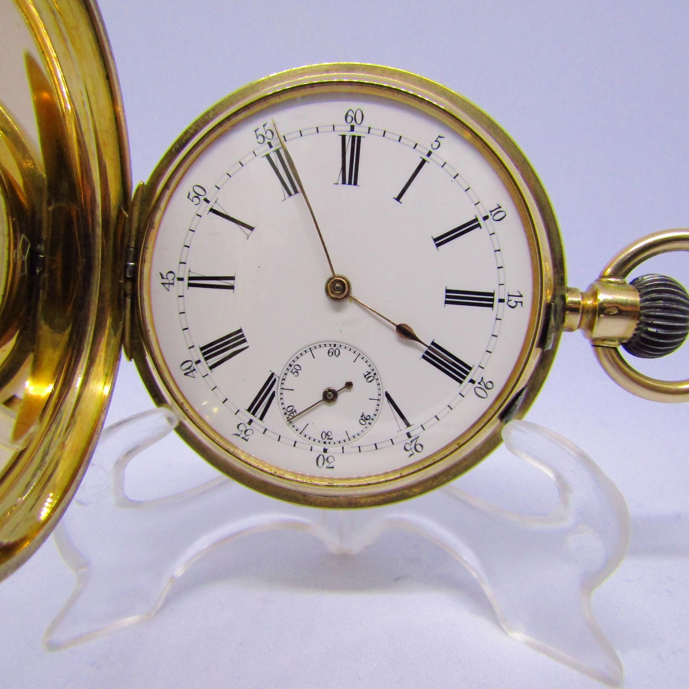 Reloj Suizo de Bolsillo, saboneta y remontoir. Oro 14k. Ca. 1890.