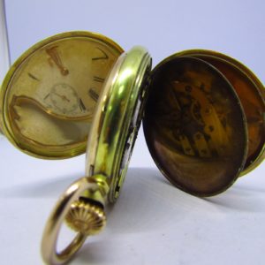 Reloj Suizo de Bolsillo, saboneta y remontoir. Oro 14k. Ca. 1890.