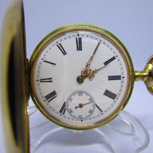 Reloj Suizo de Bolsillo, saboneta y remontoir. Oro 14k. Ca. 1890.