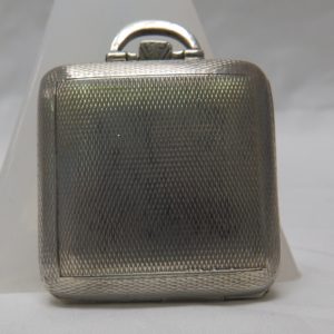 Reloj Suizo de bolsillo, sobremesa, Art Decó, saboneta y remontoir. Birmingham, 1933.