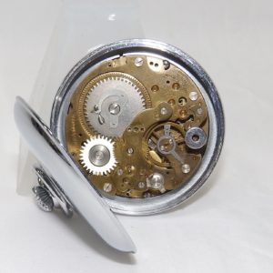 Reloj Suizo Despertador de bolsillo, sobremesa, lepine y remontoir. Sheffield, ca. 1940.