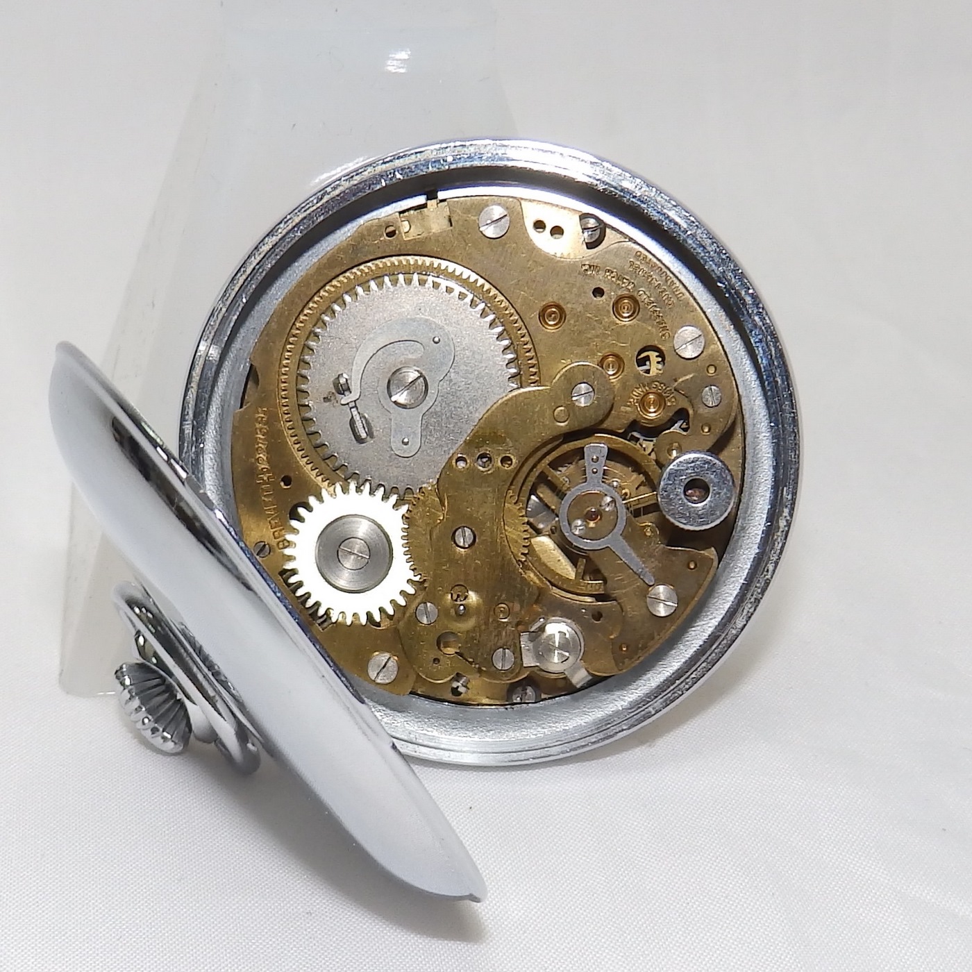 Reloj Suizo Despertador de bolsillo, sobremesa, lepine y remontoir. Sheffield, ca. 1940. Reloj Suizo Despertador de bolsillo, sobremesa, lepine y remontoir. Sheffield, ca. 1940.