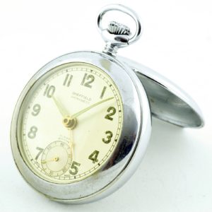Reloj Suizo Despertador de bolsillo, sobremesa, lepine y remontoir. Sheffield, ca. 1940.