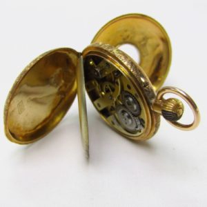 STAUFFER & SON, Co. (S.S&C.). Reloj de colgar, media saboneta (cazador)y remontoir. Ca. 1850.