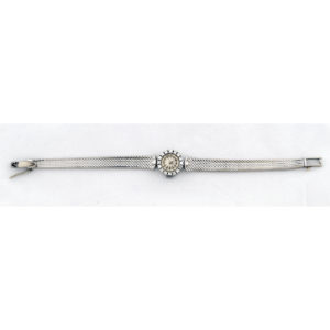 Universal Geneve. Reloj-Joya de pulsera con orla de Diamantes de 1,5 ct. Ca. 1950.