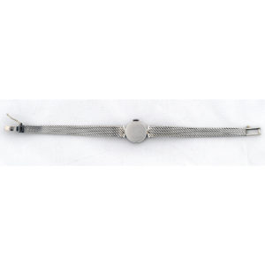 Universal Geneve. Reloj-Joya de pulsera con orla de Diamantes de 1,5 ct. Ca. 1950.