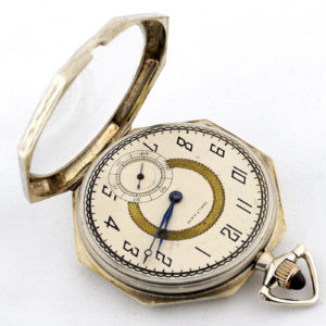 Waltham, USA. Reloj de Bolsillo, lepine y remontoir. caja octogonal. Ca. 1920.