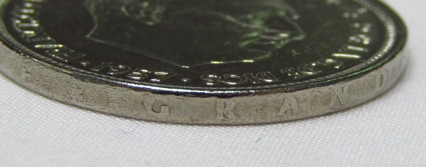 MONEDA DE 50 PESETAS. AÑO 1957. UNA LIBRE GRANDE, EN EL CANTO. MONEDA DE 50 PESETAS. AÑO 1957. UNA LIBRE GRANDE, EN EL CANTO.
