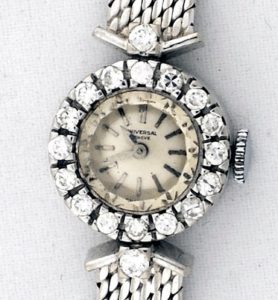 Universal Geneve. Reloj-Joya de pulsera con orla de Diamantes de 1,5 ct. Ca. 1950.