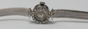 Universal Geneve. Reloj-Joya de pulsera con orla de Diamantes de 1,5 ct. Ca. 1950.