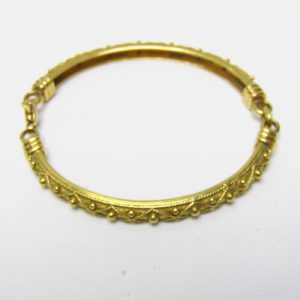 Brazalete Articulado artesanal en Oro de 18k. Longitud: 18 cm. Peso: 19 gr.
