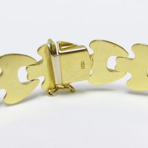 Brazalete estampado en Oro visto y Matizado de 18k. Longitud: 195 mm. Peso: 18,70 gr.