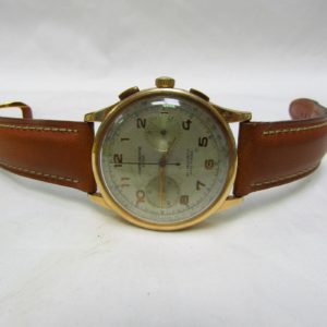 CHRONOGRAPHE SUISSE. Reloj Cronógrafo de pulsera para caballero. Oro 18k. Suiza, ca. 1950
