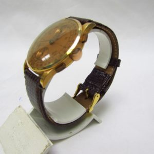 CHRONOGRAPHE SUISSE. Reloj Cronógrafo de pulsera para caballero. Oro 18k. Suiza, ca. 1950.