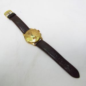 CHRONOGRAPHE SUISSE. Reloj Cronógrafo de pulsera para caballero. Oro 18k. Suiza, ca. 1950.