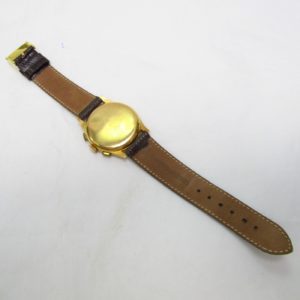 CHRONOGRAPHE SUISSE. Reloj Cronógrafo de pulsera para caballero. Oro 18k. Suiza, ca. 1950.