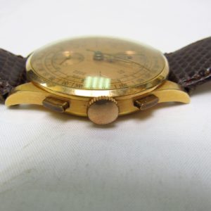 CHRONOGRAPHE SUISSE. Reloj Cronógrafo de pulsera para caballero. Oro 18k. Suiza, ca. 1950.
