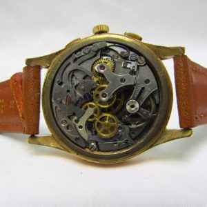 CHRONOGRAPHE SUISSE. Reloj Cronógrafo de pulsera para caballero. Oro 18k. Suiza, ca. 1950
