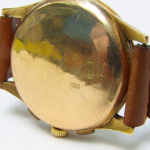 CHRONOGRAPHE SUISSE. Reloj Cronógrafo de pulsera para caballero. Oro 18k. Suiza, ca. 1950