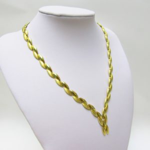 Collar de Oro Amarillo, Bicolor, Brillo y Matizado, con eslabones ojivales. 18 k. Peso 34,60gr.