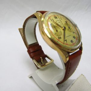 CRONOGRAPHE SUISSE. Reloj Cronógrafo de pulsera para caballero. Oro 18k. Suiza, Ca. 1950
