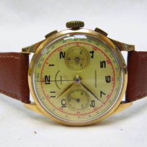 CRONOGRAPHE SUISSE. Reloj Cronógrafo de pulsera para caballero. Oro 18k. Suiza, Ca. 1950
