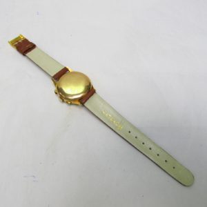 FLUDO. Reloj Cronógrafo de pusera para caballero. Fabricación suiza. Fecha ca. 1950.