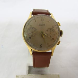 FLUDO. Reloj Cronógrafo de pusera para caballero. Fabricación suiza. Fecha ca. 1950.