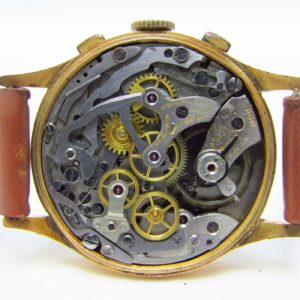 FLUDO. Reloj Cronógrafo de pusera para caballero. Fabricación suiza. Fecha ca. 1950.