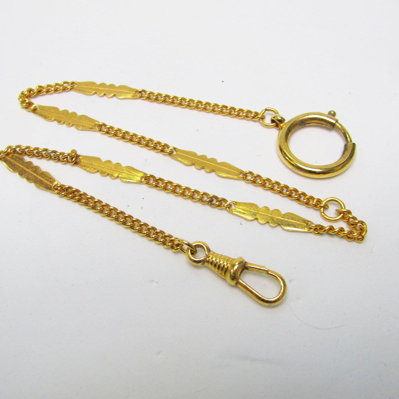 Leontina antigua. Terminal cadena para reloj de bolsillo. Oro 18k. Peso: 13,78 gr. Leontina antigua. Terminal cadena para reloj de bolsillo. Oro 18k. Peso: 13,78 gr.