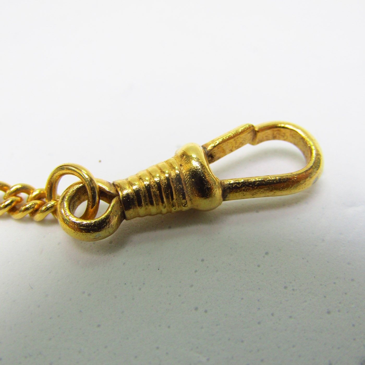Leontina antigua. Terminal cadena para reloj de bolsillo. Oro 18k. Peso: 13,78 gr. Leontina antigua. Terminal cadena para reloj de bolsillo. Oro 18k. Peso: 13,78 gr.