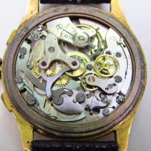 OLYMPIC. Reloj Cronógrafo de pulsera para caballero. Oro 18k. Suiza, ca. 1950.
