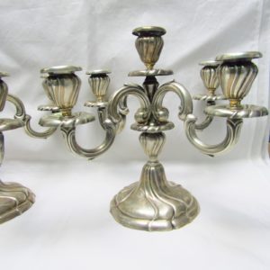 Pareja de candelabros de cinco luces en Plata de Ley. MATILDE ESPUÑES. España. Siglo XX.