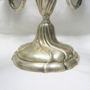 Pareja de candelabros de cinco luces en Plata de Ley. MATILDE ESPUÑES. España. Siglo XX.