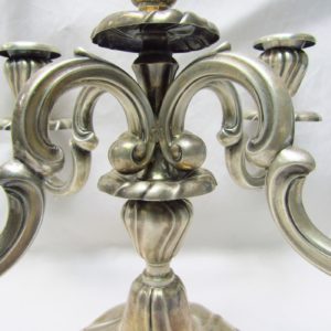 Pareja de candelabros de cinco luces en Plata de Ley. MATILDE ESPUÑES. España. Siglo XX.