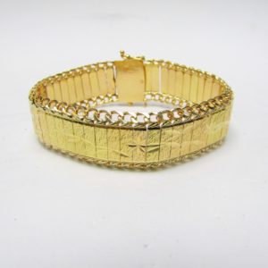 Pulsera articula en Oro Amarillo Brillo-Mate de 18k. 30,40 gr.